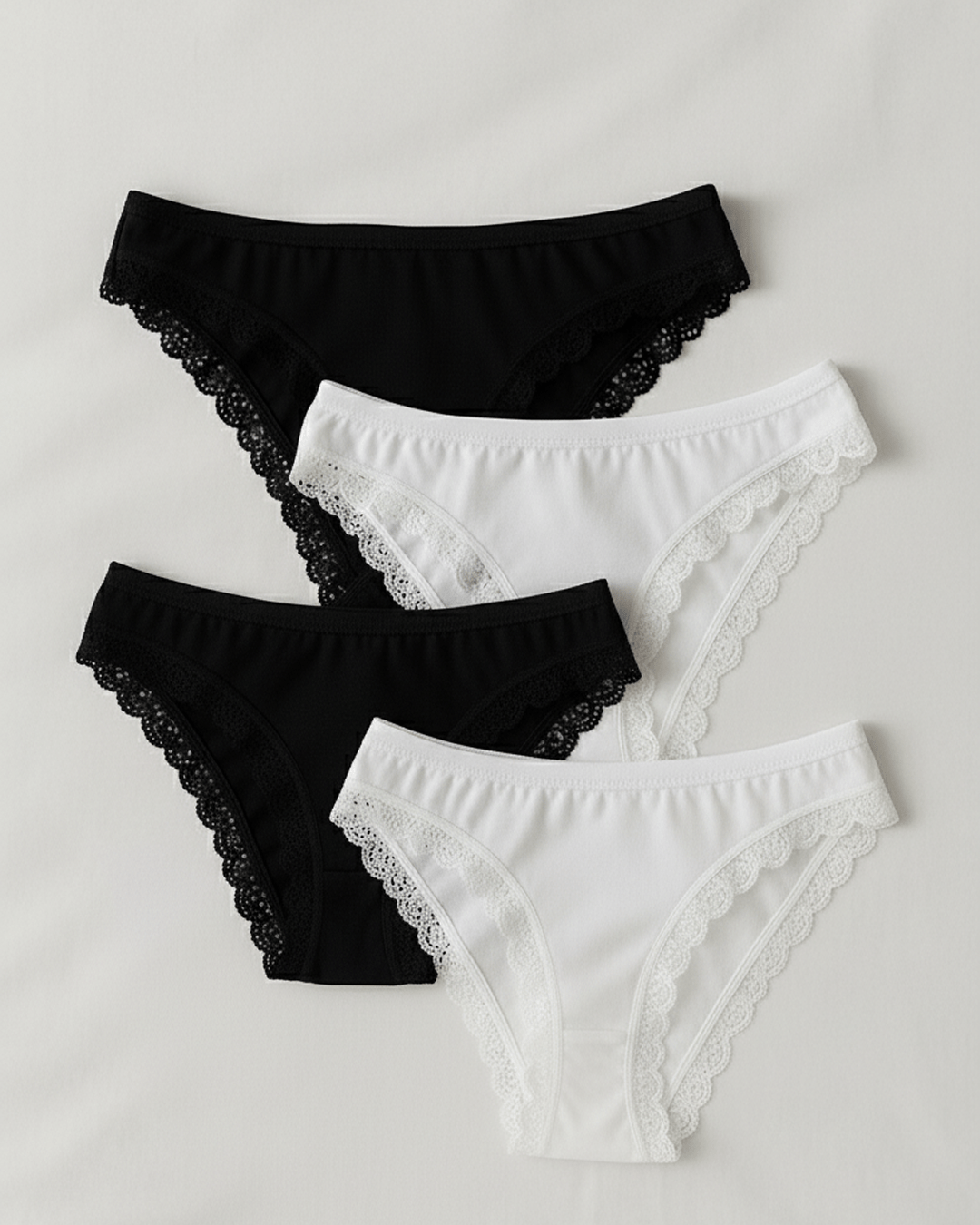 Women’s underwear with thick supportive fabric and delicate lace edges, displayed flat in soft neutral tones for everyday comfort and feminine style.