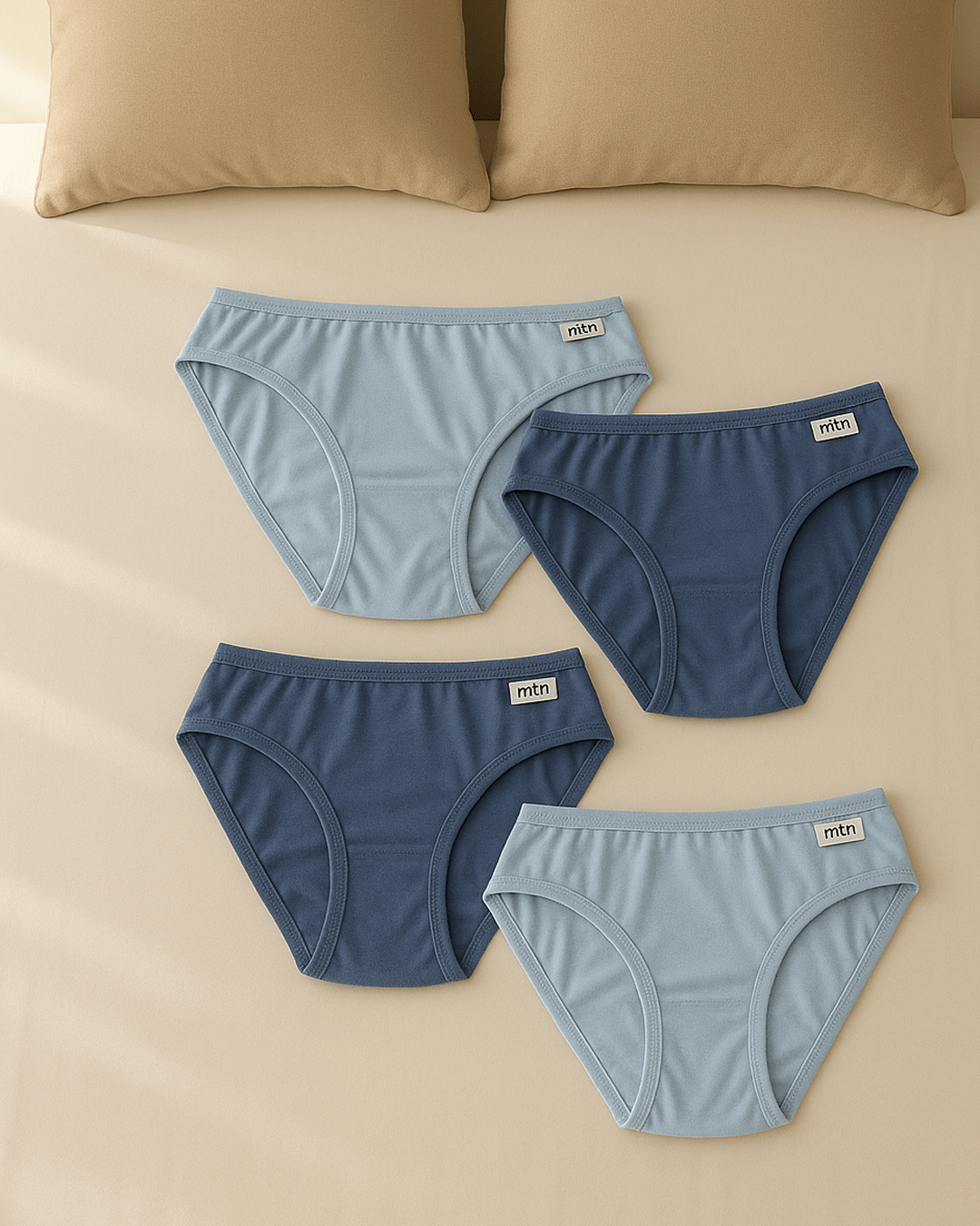 Women’s full-coverage brief underwear displayed flat in neutral colors, supportive everyday fit with smooth finish for comfortable wear.