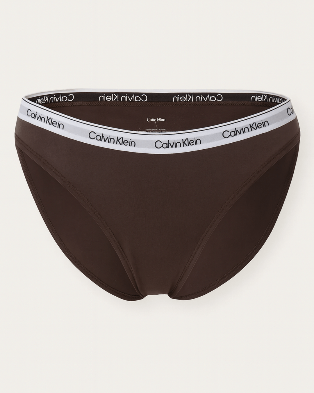 Brown Calvin Klein women’s brief underwear with branded elastic waistband, smooth everyday fit displayed flat on a white background.