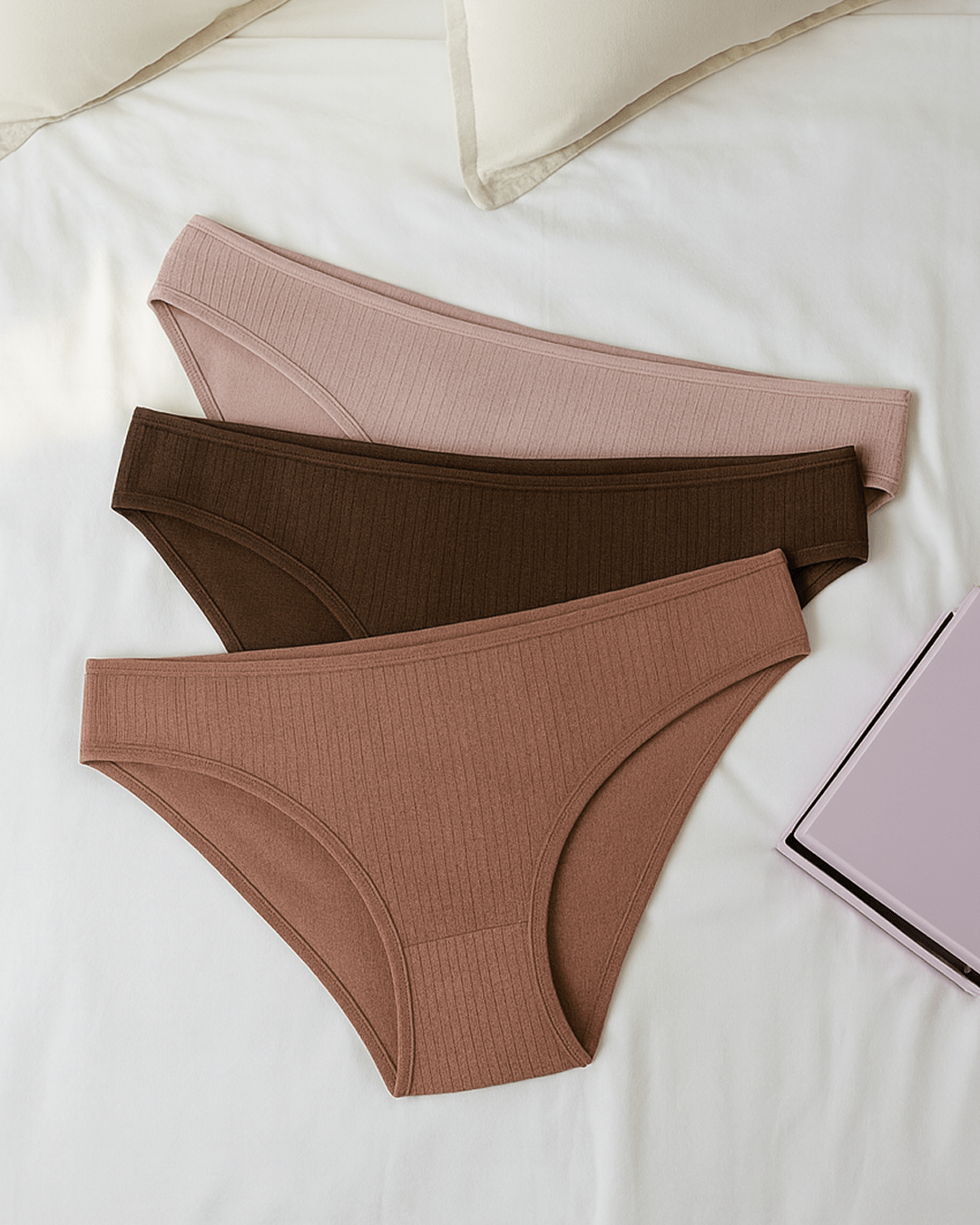 Women’s underwear with thick supportive fabric, displayed flat in soft neutral tones for everyday comfort and feminine style.