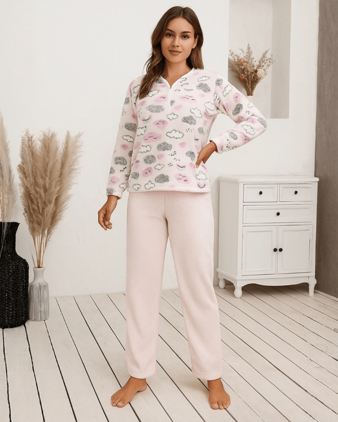 Light pink mohair pyjama set with doodle cloud print top and solid matching pants, soft winter loungewear displayed in a modern bedroom.